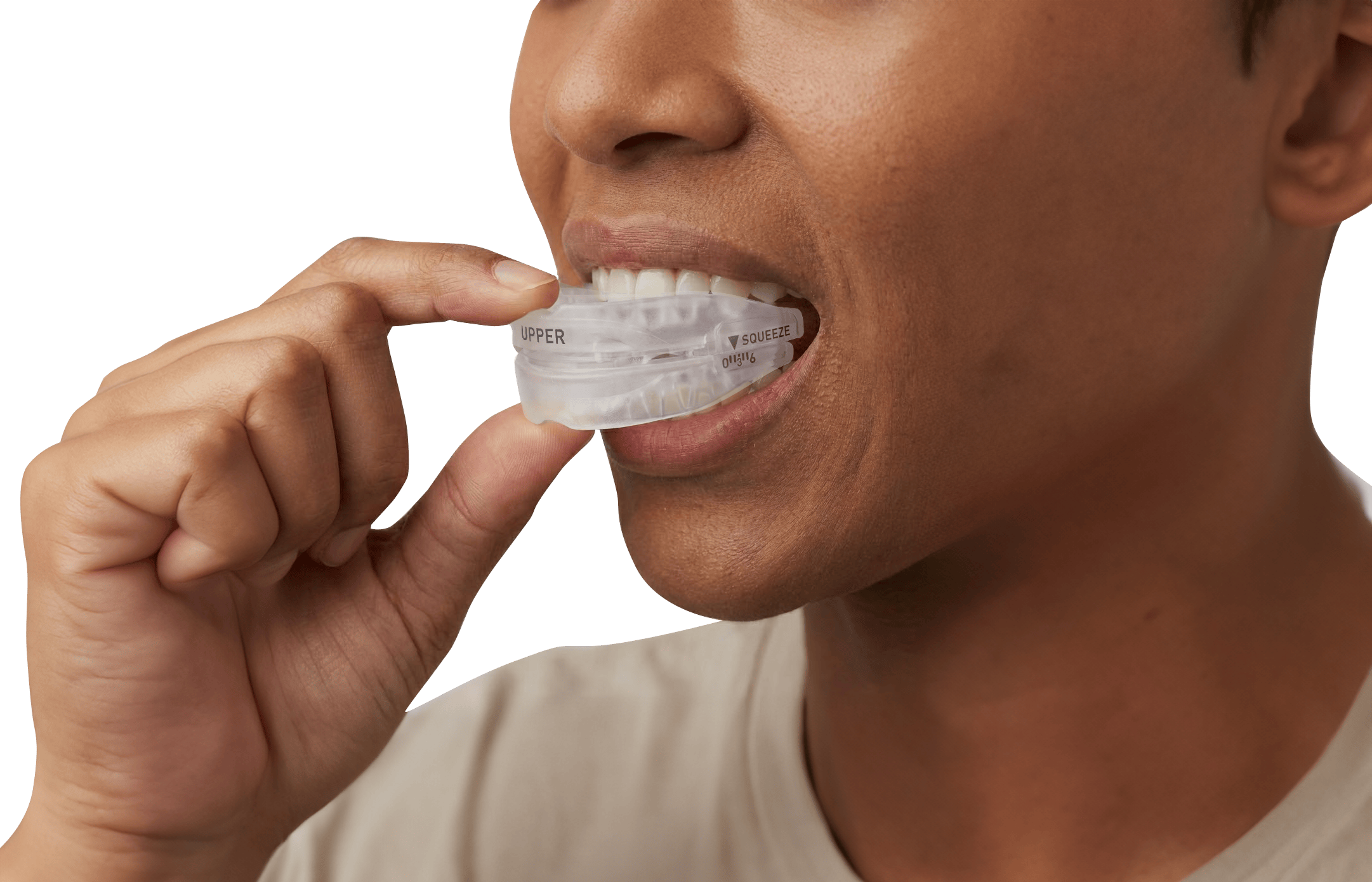 Person using SnoreRx mouthpiece